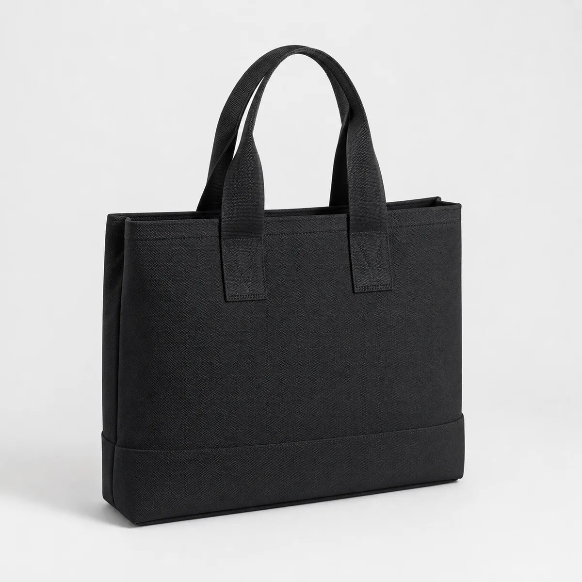 Black commuter tote with structured carry handles